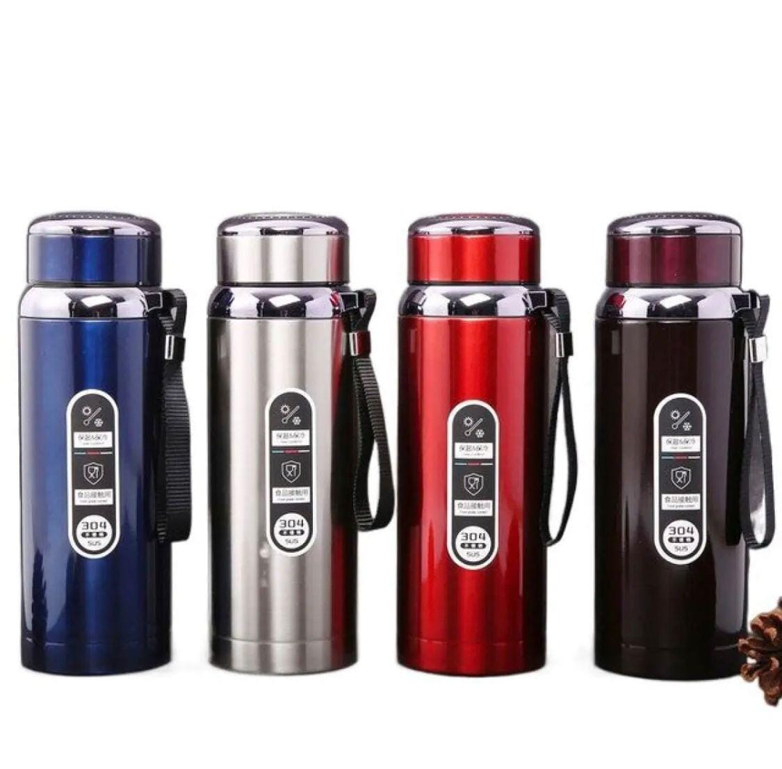 Four insulated stainless steel water bottles in blue, silver, red, and dark brown, arranged side by side on a white background.